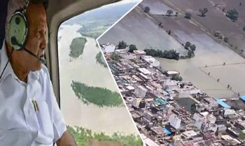 Yeddyurappa conducts aerial survey of flood affected areas, informs center about latest situation