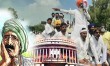 Farmers protest on new agricultural laws continues for 16th day